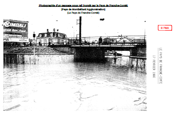 Photographie d'un passage sous rail inondé par le Pays de Franche-Comté